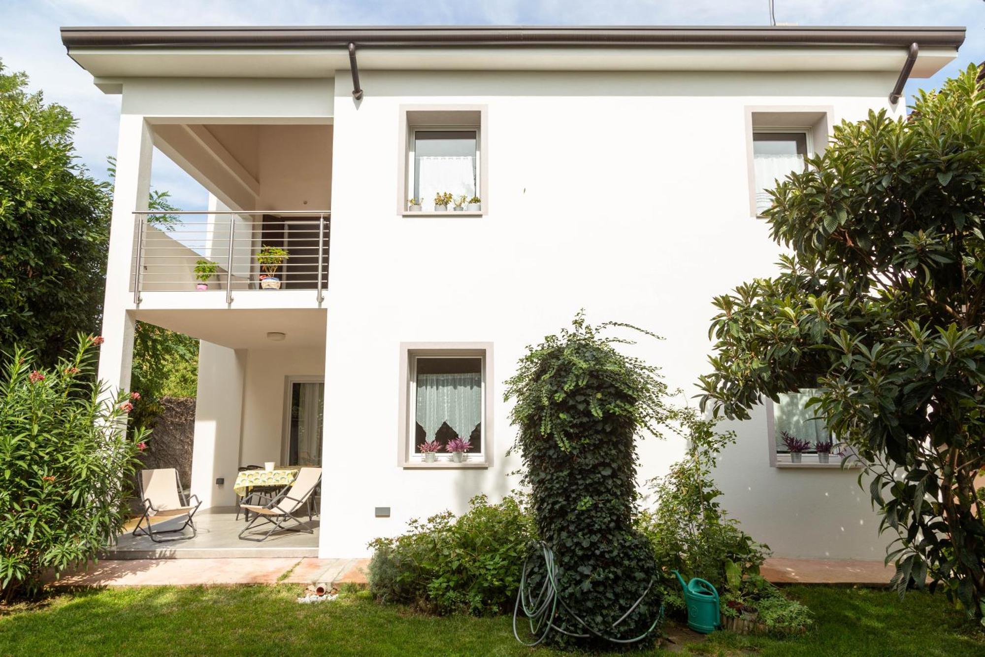 Appartamento Con Giardino Le Querce Sistiana Bagian luar foto