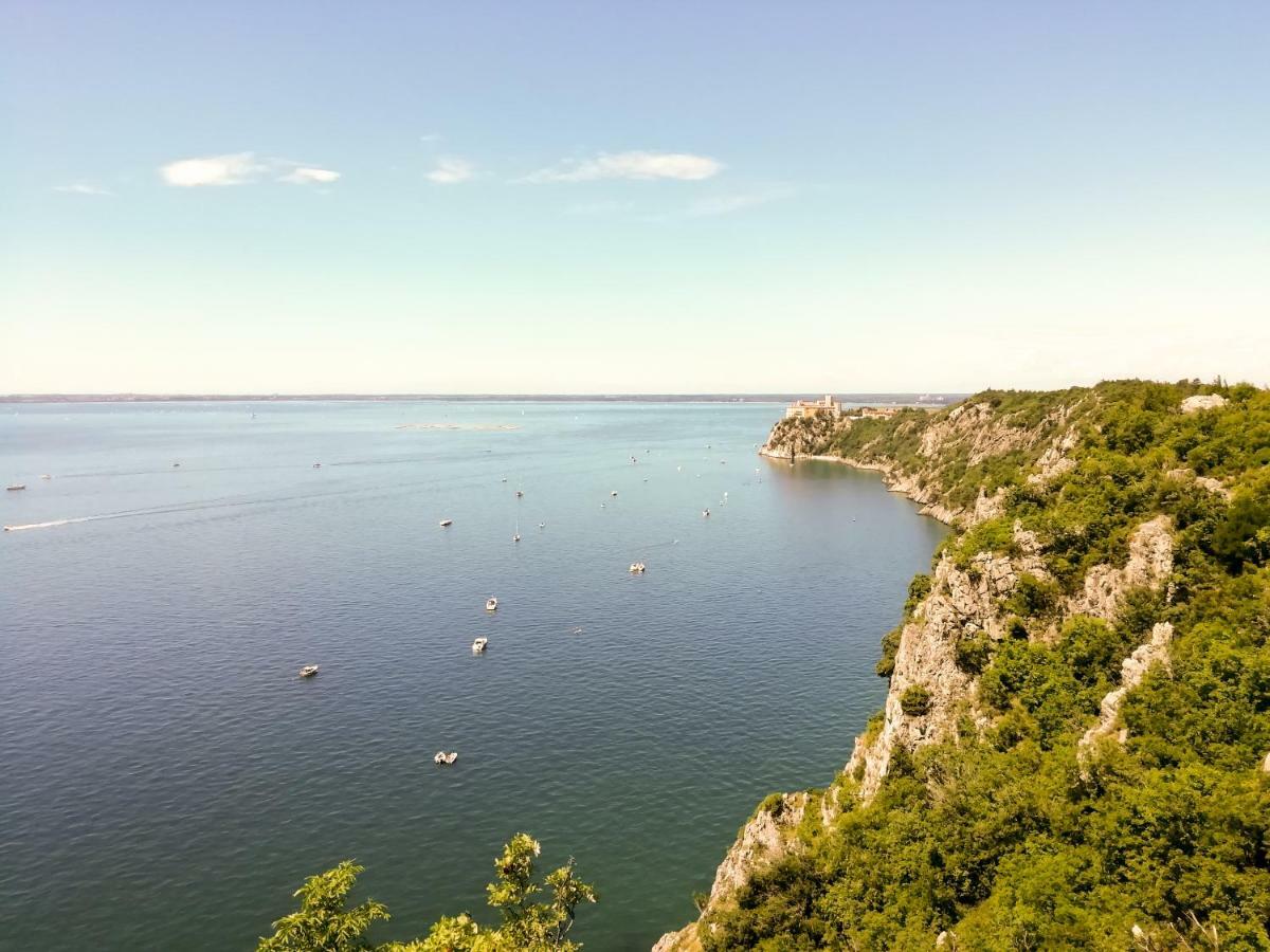 Appartamento Con Giardino Le Querce Sistiana Bagian luar foto